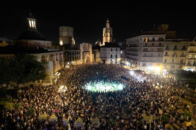 Demonstrators attend a march to mark the first anniversary of last year's deadly floods and demand accountability in Valencia on October 25, 2025. The protest comes nearly one year since torrential rain on October 29, 2024  caused flooding in towns near Valencia, killing 229 people, Spain's deadliest natural disaster in decades. (Photo by Jose JORDAN / AFP)