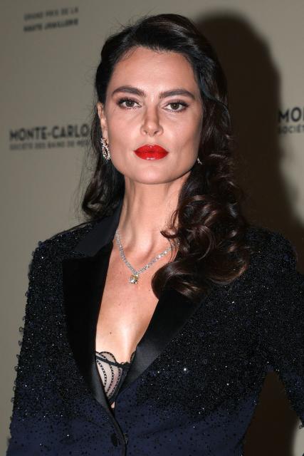 Romanian model and actress Catrinel Marlon Menghia poses upon her arrival at the first edition of "Grand Prix of High Jewelry" (GPHJ) at Sporting Monte-Carlo in Monaco, on October 25, 2025 (Photo by Valery HACHE / AFP)