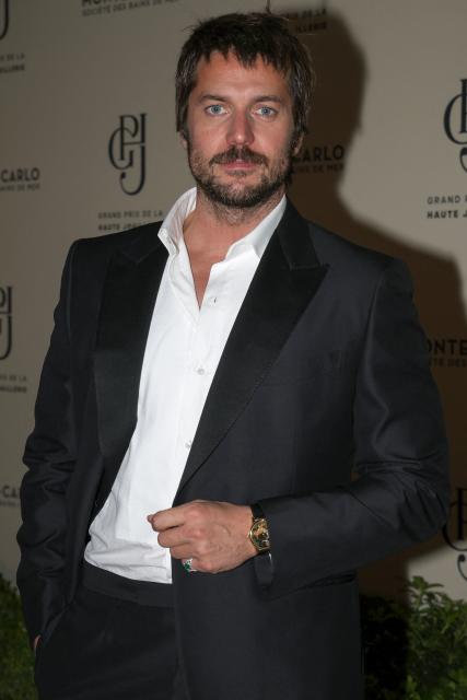 French model and actor Lucas Bravo poses upon his arrival at the first edition of "Grand Prix of High Jewelry" (GPHJ) at Sporting Monte-Carlo in Monaco, on October 25, 2025 (Photo by Valery HACHE / AFP)