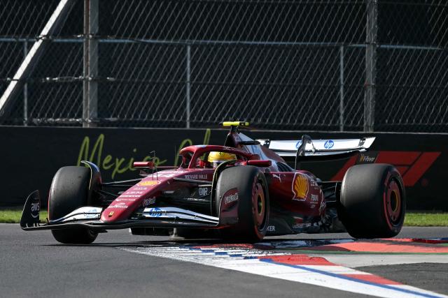Ferrari's British driver Lewis Hamilton drives during the qualifying session of the Mexico City Formula One Grand Prix at the Hermanos Rodriguez racetrack in Mexico City on October 25, 2025. (Photo by Yuri CORTEZ / AFP)