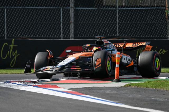 McLaren's Australian driver Oscar Piastri drives into a turn during the qualifying session of the Mexico City Formula One Grand Prix at the Hermanos Rodriguez racetrack in Mexico City on October 25, 2025. (Photo by Yuri CORTEZ / AFP)