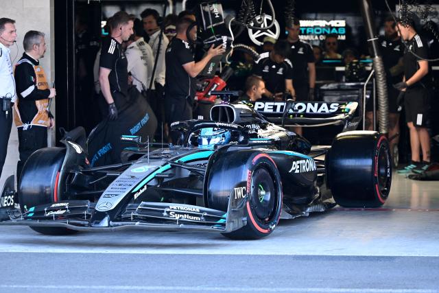 Mercedes' British driver George Russell drives out of the garage during the qualifying session of the Mexico City Formula One Grand Prix at the Hermanos Rodriguez racetrack in Mexico City on October 25, 2025. (Photo by Alfredo ESTRELLA / POOL / AFP)