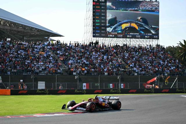 Ferrari's British driver Lewis Hamilton drives during the qualifying session of the Mexico City Formula One Grand Prix at the Hermanos Rodriguez racetrack in Mexico City on October 25, 2025. (Photo by Yuri CORTEZ / AFP)
