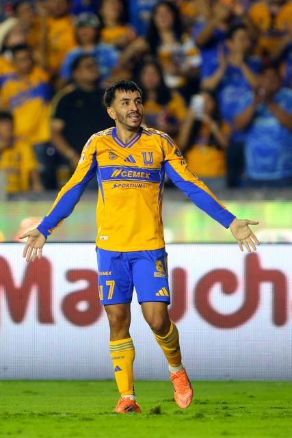 Tigres' Argentine forward #07 Angel Correa celebrates after scoring during the Liga MX Apertura tournament football match between Tigres and Tijuana at the UANL University Stadium in San Nicolas de los Garza, Nuevo Leon State, Mexico on October 25, 2025. (Photo by Julio Cesar AGUILAR / AFP)