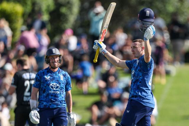 England's Harry Brook celebrates reaching a century (100 runs) during the first one-day international (ODI) cricket match between New Zealand and England at Bay Oval in Tauranga on October 26, 2025. (Photo by DJ MILLS / AFP)