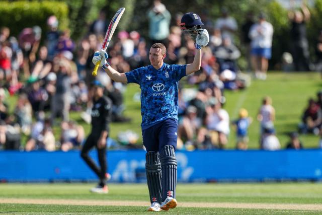 England's Harry Brook celebrates reaching a century (100 runs) during the first one-day international (ODI) cricket match between New Zealand and England at Bay Oval in Tauranga on October 26, 2025. (Photo by DJ MILLS / AFP)
