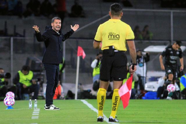 Cruz Azul's Argentine head coach Nicolas Larcamon gestures during the Liga MX Apertura football tournament match between Cruz Azul and Monterrey at the Azteca Stadium in Mexico City on October 25, 2025. (Photo by Victor Cruz / AFP)