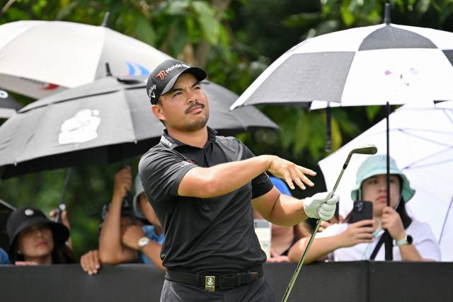 Miguel Tabuena of the Philippines reacts after hitting a shot during the final round of the International Series Philippines golf tournament at Sta. Elena Golf Club in Santa Rosa, Laguna province on October 26, 2025.  (Photo by Ted ALJIBE / AFP)