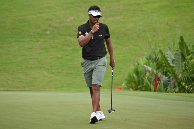 Thailand's Sarit Suwannarut reacts during the final round of the International Series Philippines golf tournament at Sta. Elena Golf Club in Santa Rosa, Laguna province on October 26, 2025.  (Photo by Ted ALJIBE / AFP)