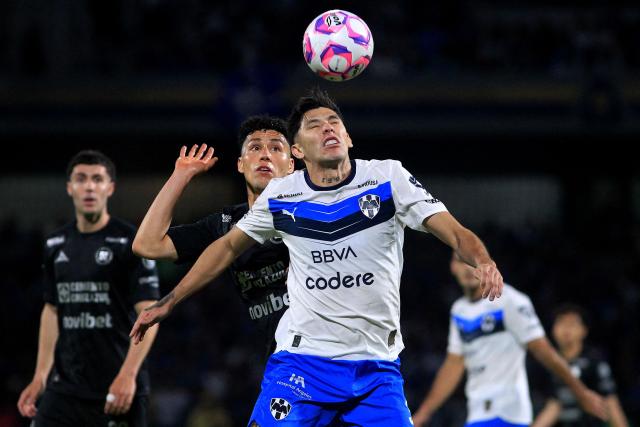 Cruz Azul's defender #02 Jorge Sanchez and Monterrey's defender #03 Gerardo Arteaga fight for the ball during the Liga MX Apertura football tournament match between Cruz Azul and Monterrey at the Azteca Stadium in Mexico City on October 25, 2025. (Photo by Victor Cruz / AFP)