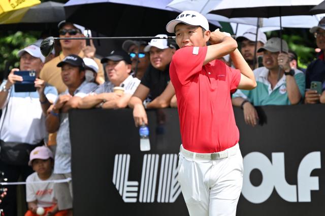 Yosuke Asaji of Japan tees off during the final round of the International Series Philippines golf tournament at Sta. Elena Golf Club in Santa Rosa, Laguna province on October 26, 2025.  (Photo by Ted ALJIBE / AFP)