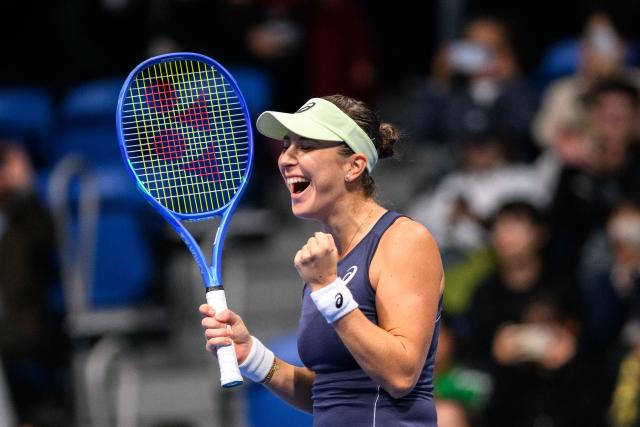 Switzerland's Belinda Bencic celebrates her victory Czech Republic's Linda Noskova during the women's singles final at the Pan Pacific Open tennis tournament in Tokyo on October 26, 2025. (Photo by Philip FONG / AFP)