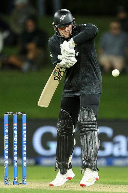 New Zealand's Nathan Smith bats during the first one-day international (ODI) cricket match between New Zealand and England at Bay Oval in Tauranga on October 26, 2025. (Photo by DJ MILLS / AFP)