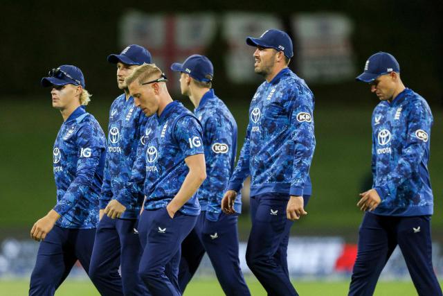 England players walk during the first one-day international (ODI) cricket match between New Zealand and England at Bay Oval in Tauranga on October 26, 2025. (Photo by DJ MILLS / AFP)