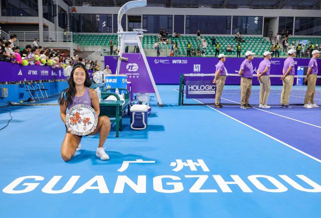 USA's Ann Li poses with her trophy after winning against New Zealand's Lulu Sun in their women's singles final match at the Guangzhou Open tennis tournament in Guangzhou, southern China's Guangdong province on October 26, 2025. (Photo by AFP) / China OUT