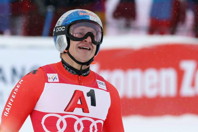 Switzerland's Marco Odermatt celebrates after winning after the men's giant slalom event of the FIS Alpine Skiing World Cup in Soelden, Austria on October 26, 2025. (Photo by Johann GRODER / various sources / AFP) / Austria OUT
