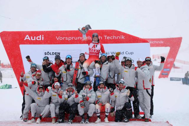 Winner Switzerland's Marco Odermatt celebrates with his team after the men's giant slalom event of the FIS Alpine Skiing World Cup in Soelden, Austria on October 26, 2025. (Photo by Johann GRODER / various sources / AFP) / Austria OUT