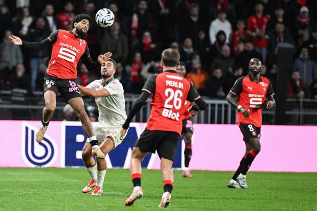 Rennes’ French midfielder #45 Madhi Camara (L) heads the ball during the French L1 football match between Stade Rennais FC and OGC Nice at the Roazhon Park stadium in Rennes, western France, on October 26, 2025. (Photo by Sebastien Salom-Gomis / AFP)