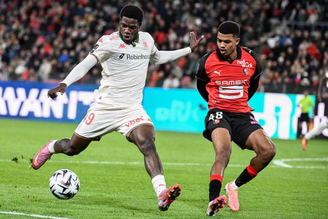 Nice’s Cameroonian #47 Bernard Nguene (L) fights for the ball with Rennes’ Moroccan defender #48 Ait Boudlal (R) during the French L1 football match between Stade Rennais FC and OGC Nice at the Roazhon Park stadium in Rennes, western France, on October 26, 2025. (Photo by Sebastien Salom-Gomis / AFP)