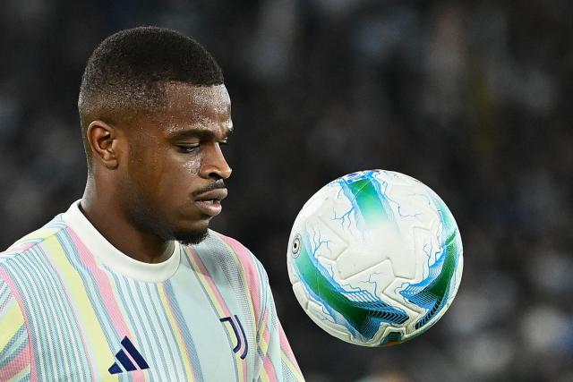 Juventus' French defender #15 Pierre Kalulu Kyatengwan warms up ahead of the the Italian Serie A football match between Lazio and Juventus at Olympic stadium in Rome on October 26, 2025. (Photo by Isabella BONOTTO / AFP)