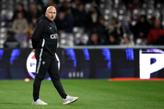 Toulon's French head coach Pierre Mignoni looks on prior to the French Top14 rugby union match between Stade Toulousain (Toulouse) and Toulon at the TFC Stadium in Toulouse, southwestern France, on October 26, 2025. (Photo by Valentine CHAPUIS / AFP)