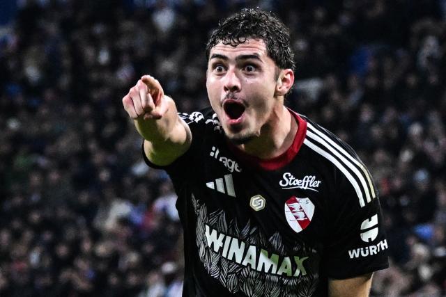 Strasbourg's Argentine forward #09 Joaquin Panichelli celebrates after scoring Strasbourg's first goal during the French L1 football match between Olympique Lyonnais (OL) and RC Strasbourg Alsace at the Parc Olympique Lyonnais stadium in Decines-Charpieu, central-eastern France, on October 26, 2025. (Photo by OLIVIER CHASSIGNOLE / AFP)