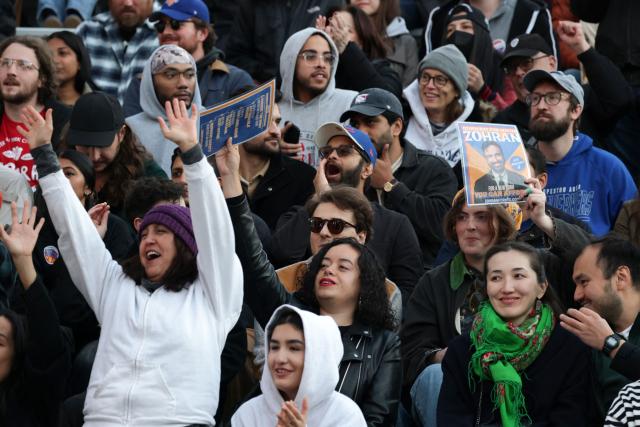 People attend a campaign rally for New York City mayoral candidate Zohran Mamdani in New York City on October 26, 2025. New Yorkers will cast their votes for mayor on November 4, 2025. Mamdani, the Democratic candidate, is the current frontrunner ahead of former New York Governor and independent candidate Andrew Cuomo and Republican candidate Curtis Sliwa. (Photo by ANGELA WEISS / AFP)
