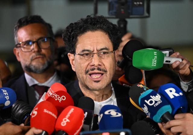 (FILES) Colombian Senator Ivan Cepeda speaks to the media after leaving the Paloquemao Judicial Complex in Bogota on July 28, 2025. Colombian Senator Ivan Cepeda was elected as a presidential candidate for the party of President Gustavo Petro to succeed him in the 2026 elections, after a primary election on October 26, 2025. Cepeda is a bitter enemy of the right wing who brought former President Alvaro Uribe to justice. (Photo by Raul ARBOLEDA / AFP)