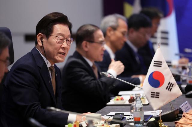 South Korea's President Lee Jae Myung speaks during a bilateral meeting with Malaysia's Prime Minister Anwar Ibrahim on the sidelines of the 47th Association of Southeast Asian Nations (ASEAN) Summit in Kuala Lumpur on October 27, 2025. (Photo by Hasnoor Hussain / POOL / AFP)