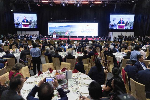 Malaysia’s Prime Minister Anwar Ibrahim delivers his speech during a reception to mark East Timor's admission to ASEAN during the 47th Association of Southeast Asian Nations (ASEAN) Summit in Kuala Lumpur on October 27, 2025. (Photo by HOW Hwee Young / POOL / AFP)