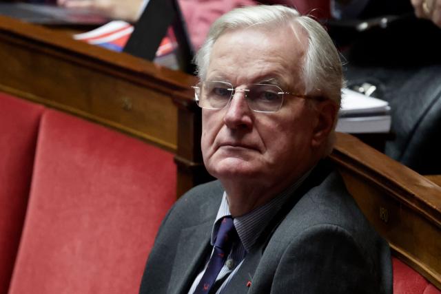 Droite Republicaine's MP Michel Barnier attends  the examination a draft finance bill as part of the debate and review of the 2026 State Budget at the French National Assembly, in Paris, on October 27, 2025. (Photo by STEPHANE DE SAKUTIN / AFP)