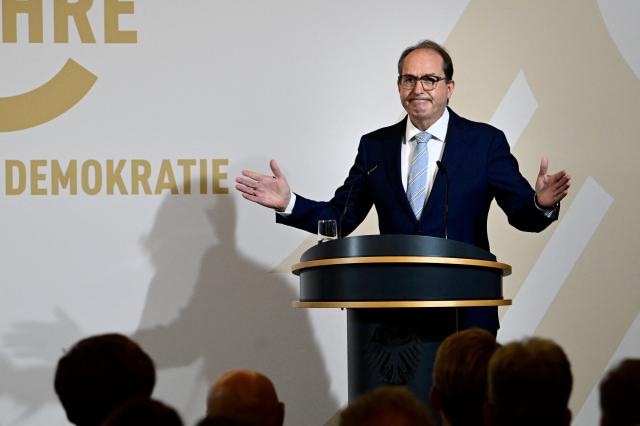 German Interior Minister Alexander Dobrindt speaks during a ceremony marking the 75 years of the Office for the Protection of the Constitution, on October 27, 2025 at the Interior Ministry in Berlin. (Photo by Tobias SCHWARZ / AFP)
