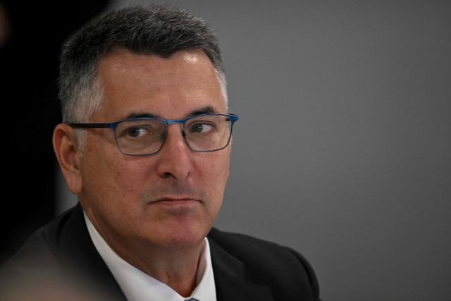 Israeli Foreign Minister Gideon Sa'ar listens to his Hungarian counterpart (not pictured) as they meet at Puskas Arena in Budapest, Hungary, on October 27, 2025. (Photo by Attila KISBENEDEK / AFP)