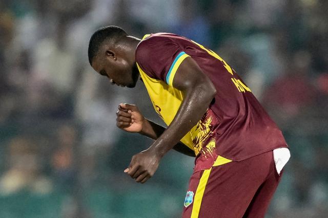 West Indies' Jason Holder celebrates after taking the wicket of Bangladesh's Shamim Hossain during the first Twenty20 international cricket match between Bangladesh and West Indies at a stadium in Chittagong on October 27, 2025. (Photo by MUNIR UZ ZAMAN / AFP)
