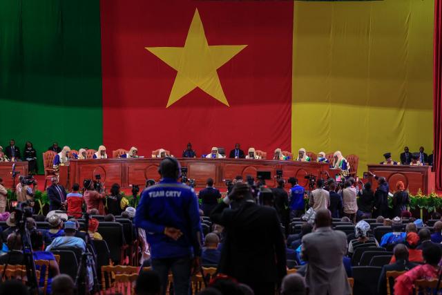 Members of Cameroon’s Constitutional Council read out presidential election results at the Yaounde Conference Centre in Yaounde, on October 27, 2025. Cameroon's President Paul Biya, 92, has been re-elected for an eighth term with 53.7 percent of the vote, according to official results announced by the Constitutional Council on October 27, 2025. (Photo by AFP)