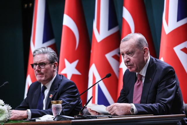 Britain's Prime Minister Keir Starmer (L) and Turkey's President Recep Tayyip Erdogan (R) hold a joint press conference after signing an $11 billion agreement for 20 Eurofighter jets at the Presidential Palace in Ankara on October 27, 2025. Starmer said London had reached an agreement to sell Eurofighter jets to Ankara in a 10-year deal worth nearly $11 billion. Britain's defence ministry said the order would involve 20 Eurofighters in what it described as the "biggest fighter jet deal in a generation". (Photo by Adem ALTAN / AFP)