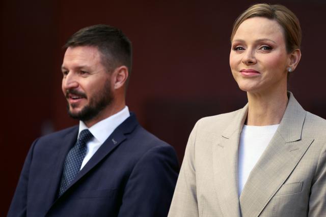 Princess Charlene of Monaco with her brother Gareth Wittstock attend the presentation of the canine brigade in The Principality of Monaco on October 27, 2025. The princess is the initiator of the creation of the canine brigade and she is president of SPA Monaco (Societe Protectrice des animaux) (Photo by Valery HACHE / AFP) / / NO TABLOIDS WEB & PRINT, NO DAILY MAIL, NO DAILY MAIL GROUP, NO VOICI, NO CLOSER