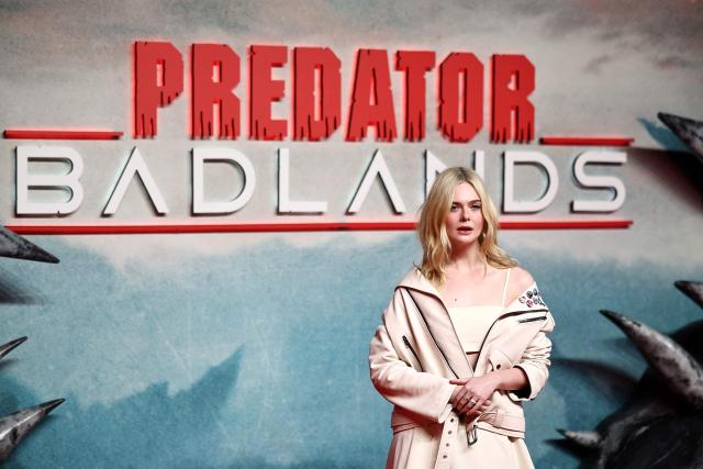 US actor Elle Fanning poses on the red carpet upon arrival to attend the UK special screening of "Predator: Badlands" at the BFI IMAX in London, on October 27, 2025. (Photo by HENRY NICHOLLS / AFP)