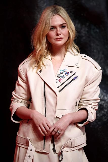 US actor Elle Fanning poses on the red carpet upon arrival to attend the UK special screening of "Predator: Badlands" at the BFI IMAX in London, on October 27, 2025. (Photo by HENRY NICHOLLS / AFP)