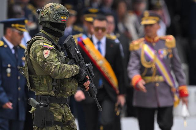 Ecuador's President Daniel Noboa attends a ceremony marking the 105th anniversary of the founding of the National Aviation and Ecuadorian Air Force Day, at Mariscal Sucre Air Base in Quito, on October 27, 2025. (Photo by Rodrigo BUENDIA / AFP)