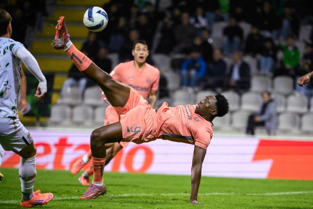 FC Porto's Spanish forward #09 Samuel Omorodion kicks at goal but fails to score during the Portuguese league football match between Moreirense FC and FC Porto at Comendador Joaquim de Almeida Freitas stadium in Moreira de Conegos on October 27, 2025. (Photo by Miguel RIOPA / AFP)