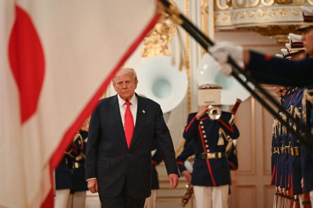 US President Donald Trump reviews an honour guard of the Japan Self-Defense Force at the Akasaka State Guest House in Tokyo on October 28, 2025. (Photo by ANDREW CABALLERO-REYNOLDS / AFP)