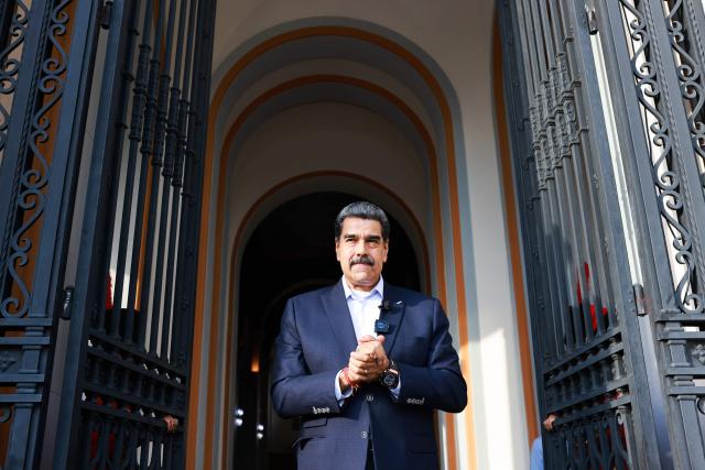 This handout picture released by the Venezuelan Presidency shows Venezuela's President Nicolas Maduro gesturing during an official TV show in Caracas on October 27, 2025. Venezuelan President Nicolas Maduro on October 27, announced he had suspended an energy agreement with Trinidad and Tobago in response to the neighboring island nation's welcoming of a US warship. (Photo by Marcelo Garcia / Venezuelan Presidency / AFP)