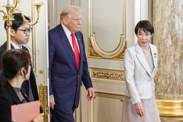 Japan's Prime Minister Sanae Takaichi (R) and US President Donald Trump attend a Japan-US Summit at the Akasaka State Guest House in Tokyo on October 28, 2025. (Photo by FRANCK ROBICHON / POOL / AFP)