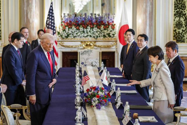 Japan's Prime Minister Sanae Takaichi (R) and US President Donald Trump attend a Japan-US Summit at the Akasaka State Guest House in Tokyo on October 28, 2025. (Photo by FRANCK ROBICHON / POOL / AFP)