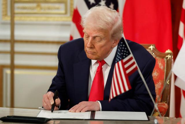 US President Donald Trump attends a signing ceremony with Japan's Prime Minister Sanae Takaichi at the Akasaka State Guest House in Tokyo on October 28, 2025. (Photo by Kiyoshi Ota / POOL / AFP)