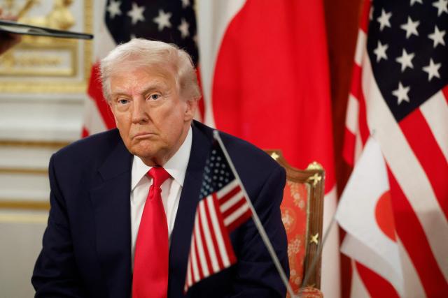 US President Donald Trump attends a signing ceremony with Japan's Prime Minister Sanae Takaichi at the Akasaka State Guest House in Tokyo on October 28, 2025. (Photo by Kiyoshi Ota / POOL / AFP)