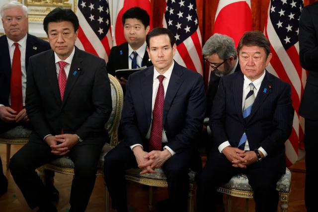 US Secretary of State Marco Rubio (C), Japan's Foreign Minister Toshimitsu Motegi (R) and Japan's Chief Cabinet Secretary Minoru Kihara (L) take part in a meeting between family members of Japanese citizens abducted by North Korea and US President Donald Trump at the Akasaka State Guest House in Tokyo on October 28, 2025. (Photo by Kiyoshi Ota / POOL / AFP)