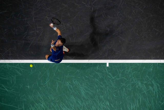 Czech Republic's Jiri Lehecka serves to Monaco's Valentin Vacherot during their men's singles match on day two of the Paris ATP Masters 1000 tennis tournament at the Paris La Défense Arena in Nanterre, on the outskirts of Paris, on October 28, 2025. (Photo by JULIEN DE ROSA / AFP)