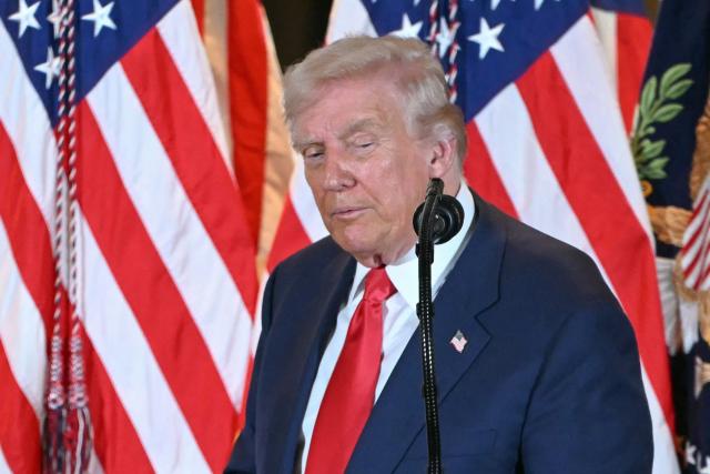 US President Donald Trump reacts at the end of his speech to business leaders at the US ambassador's residence in Tokyo on October 28, 2025. (Photo by ANDREW CABALLERO-REYNOLDS / AFP)